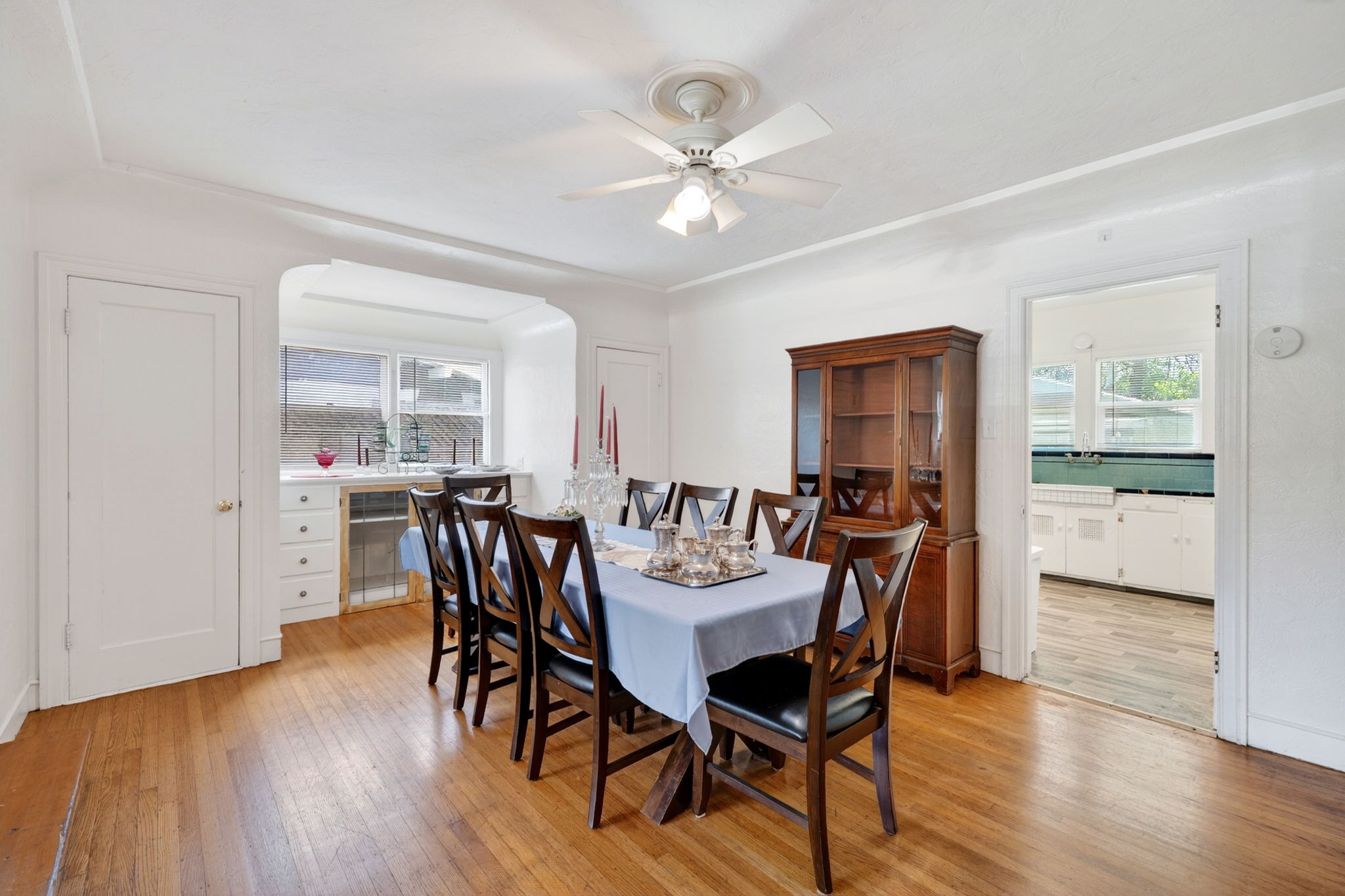 The dining room.  The door on the left goes to the garage and the door on the right is a closet.