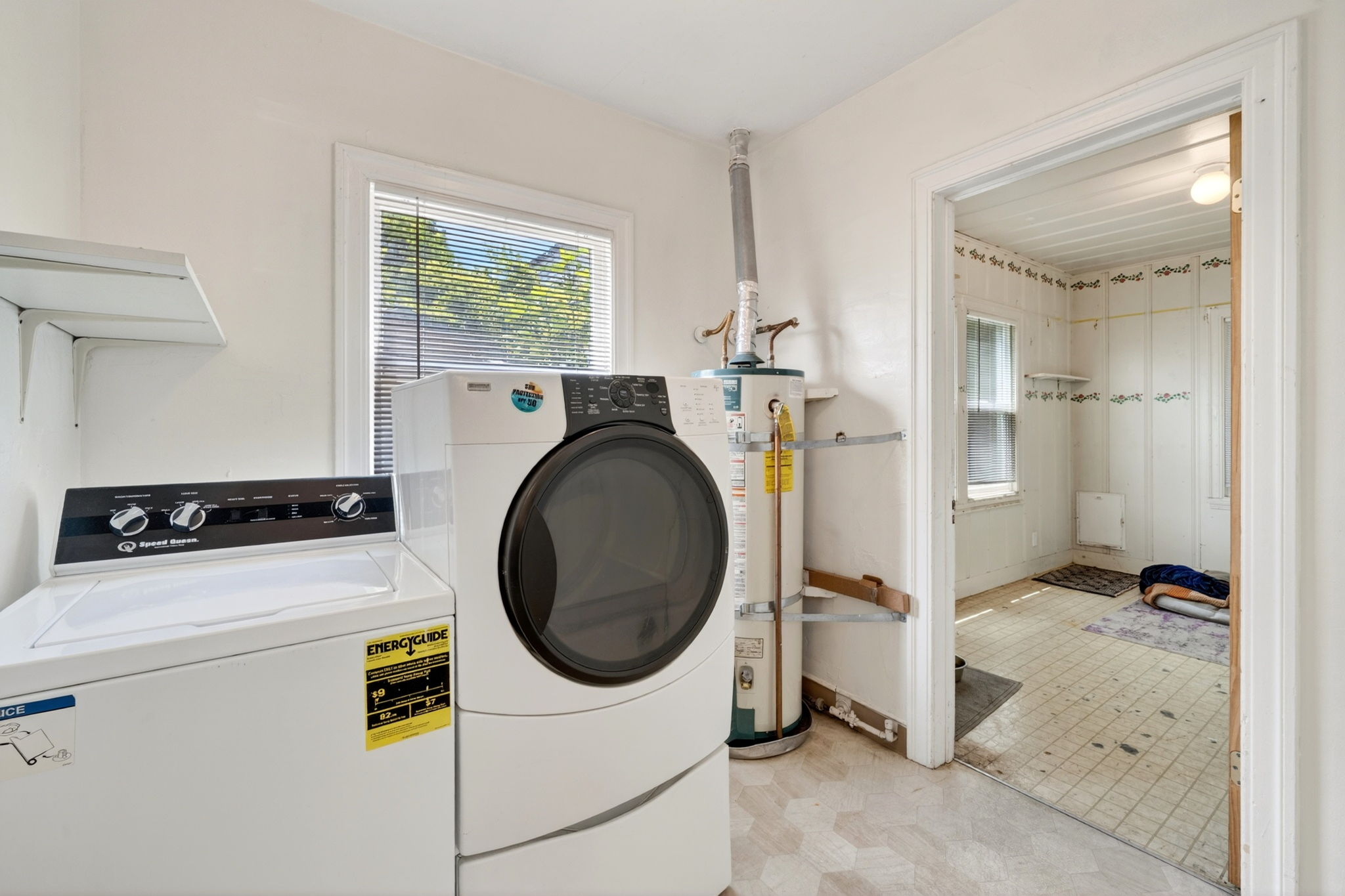 The laundry area with the canning room to the right.