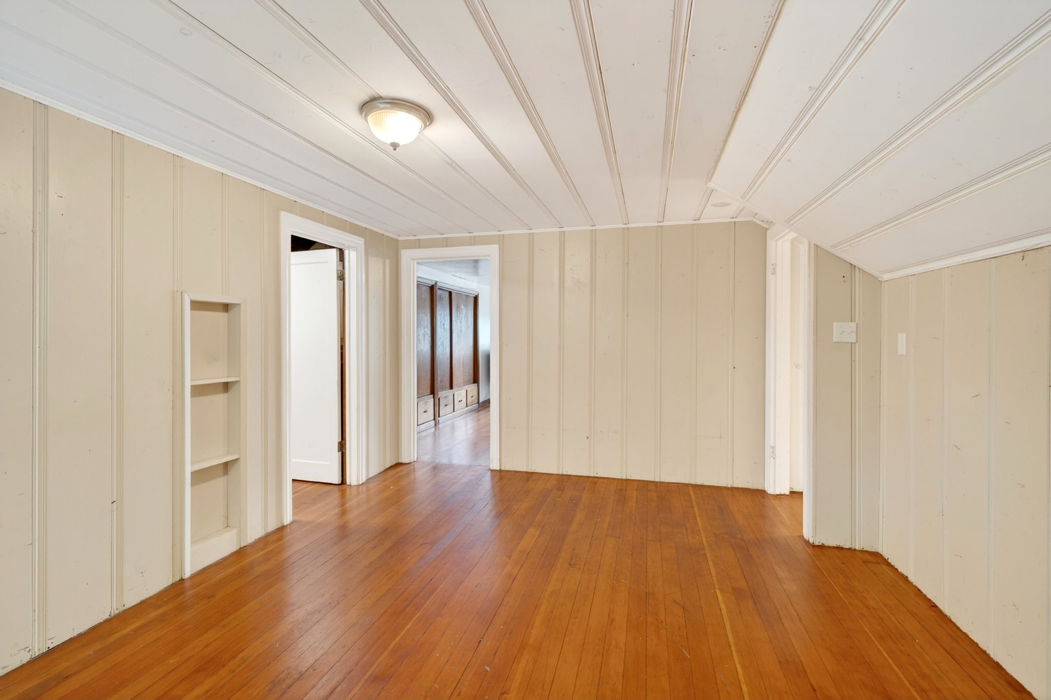 The upstairs sitting room.  The bedroom is straight forward.  The bathroom is to the left.  The stairs are to the right.