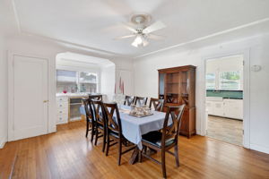 The dining room.  The door on the left goes to the garage and the door on the right is a closet.