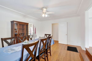 The dining room.  The kitchen is to the left.  2 bedrooms and a bathroom are through the door in front.  The living room is to the right.