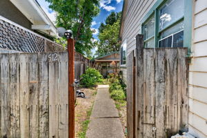 The side gate looking from the street towards 512 Howard St and the backyard for 510 Howard St.