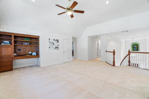 landing upstairs has built in book shelves and ample 3rd living space