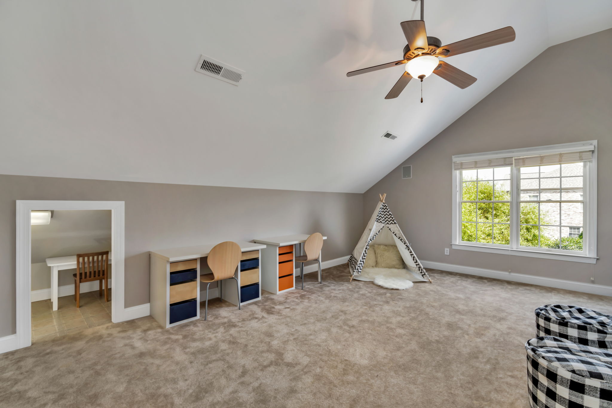 Generous bonus room has endless possibilities (entertainment, game room, playroom, etc.) Has built-in wall desk as well as under eave finished space.