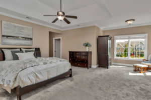 Luxury master suite with separate sitting area, large windows, enormous closet, linen closet, luxury bathroom.