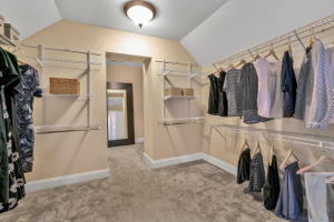 Enormous master closet with hidden extra finished storage plus abundant under eave storage.