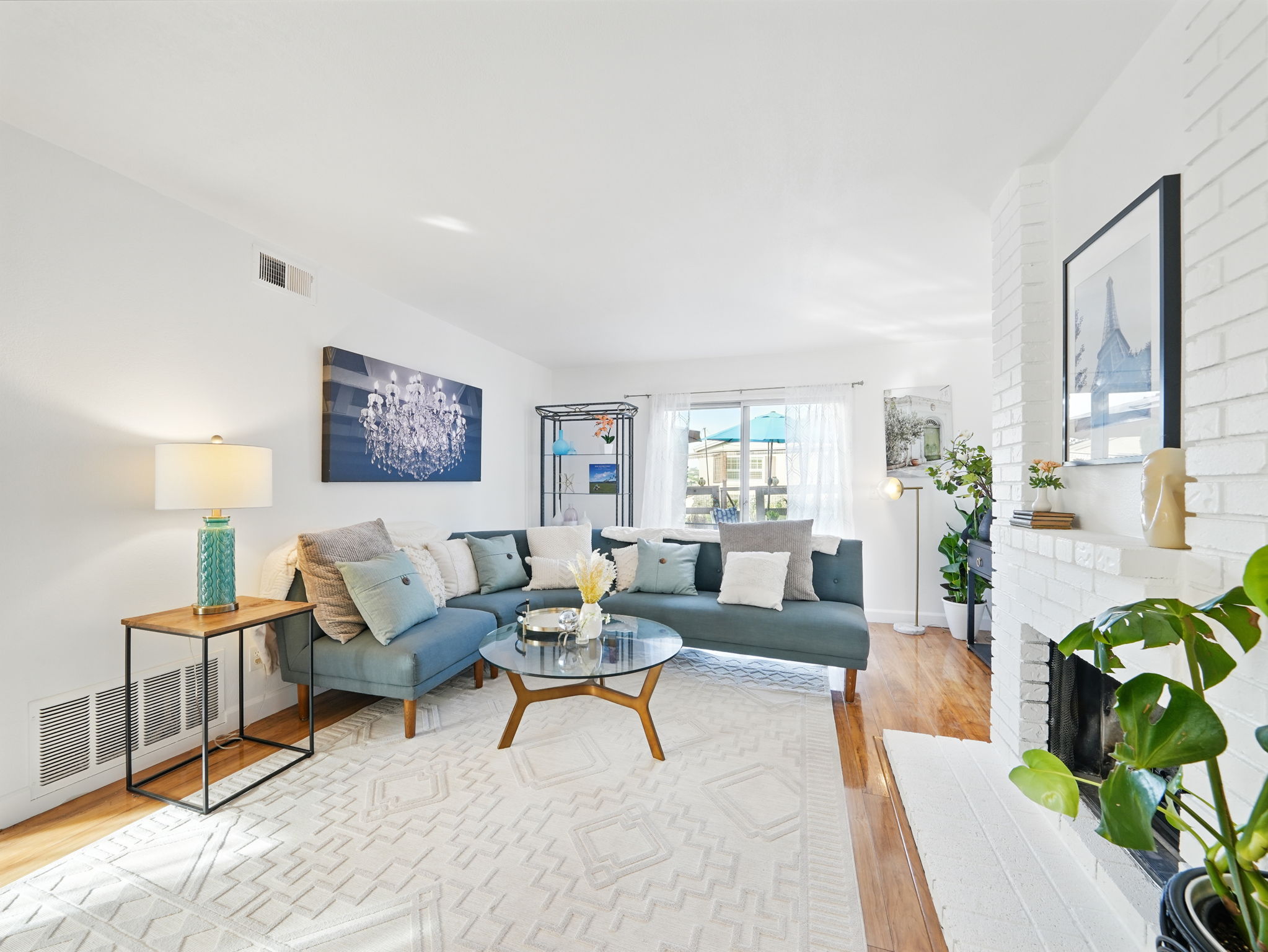 Living Room w/Fireplace + Patio Access
