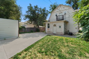 Detached Garage & Alley Access.