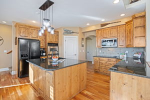 Spacious kitchen with custom cabinets