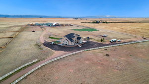 Aerial view of property showing front pasture at entrance