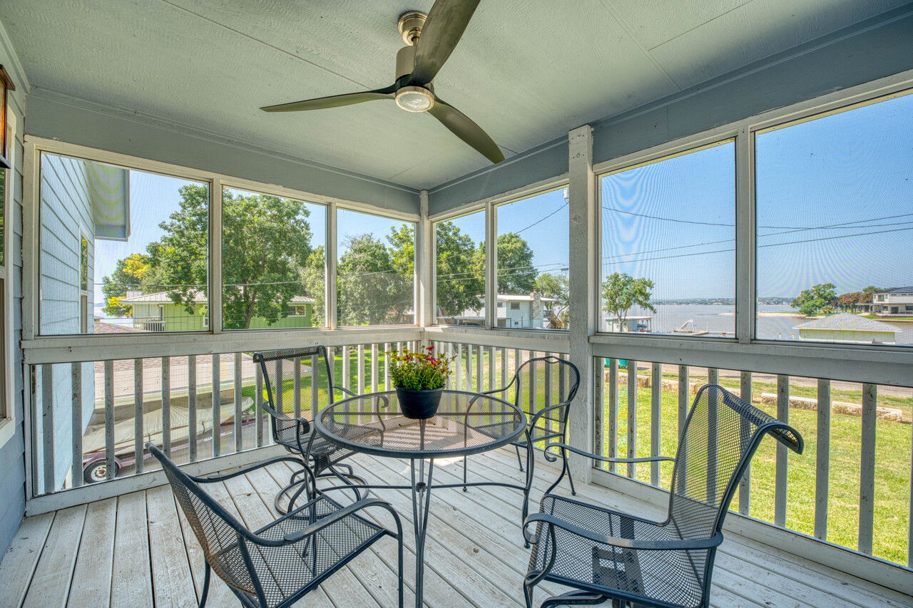 screened porch off primary with water views