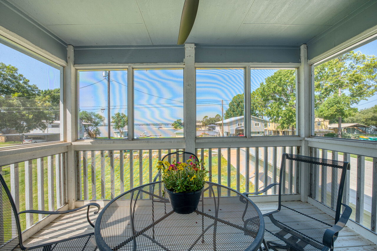 screened porch off primary with water views