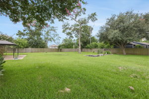 Time to retreat to this ideal backyard for outdoor activities and relaxation.