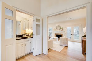 5 Foyer w Wet Bar + Living Room