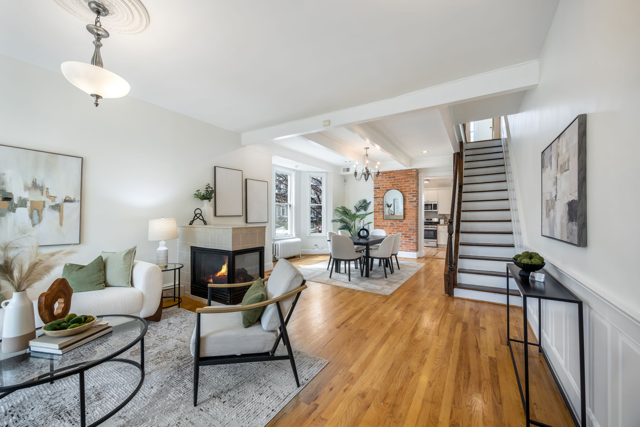 Open main level w high ceilings & gas fireplace