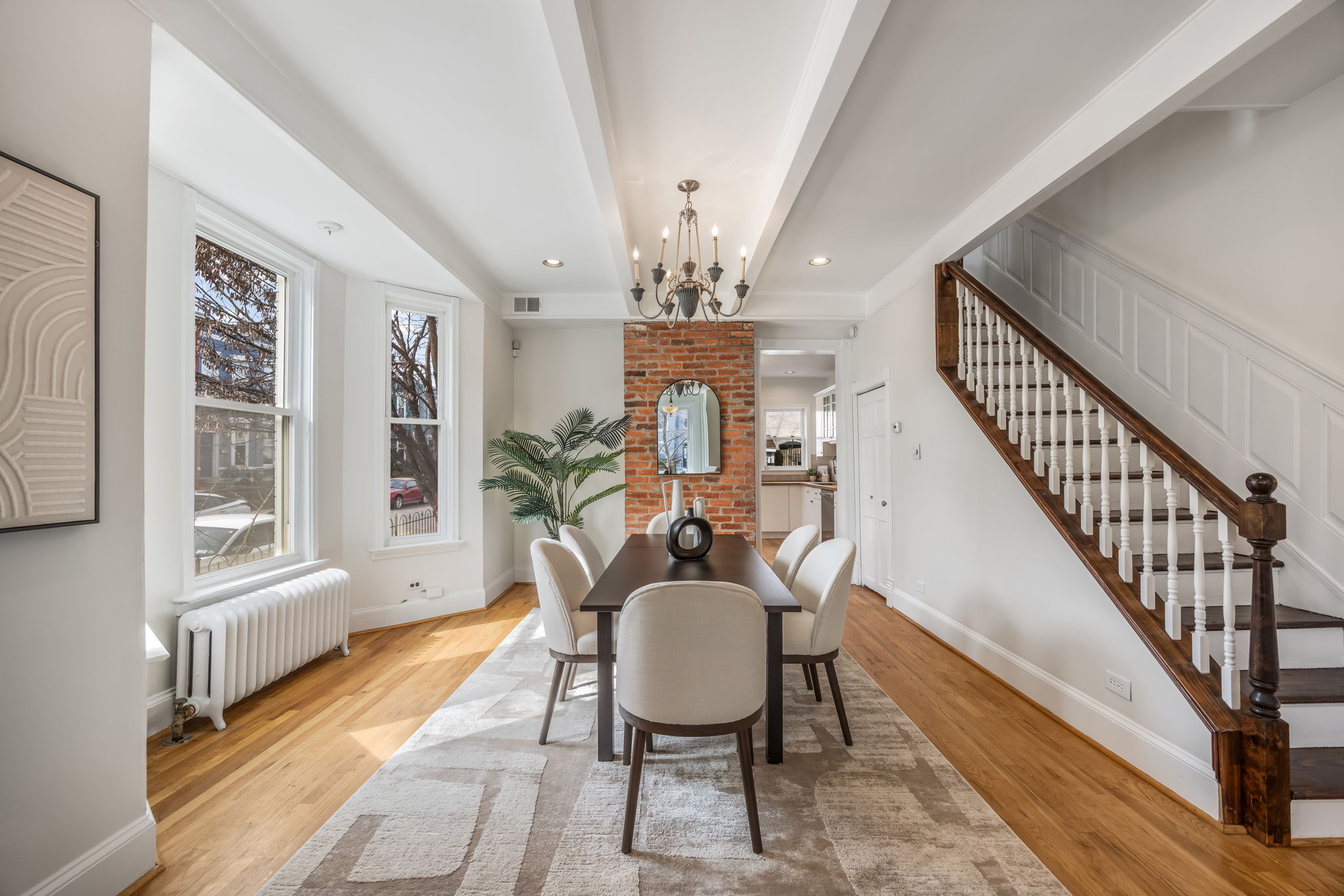 Separate dining area w high ceilings and hardwoods