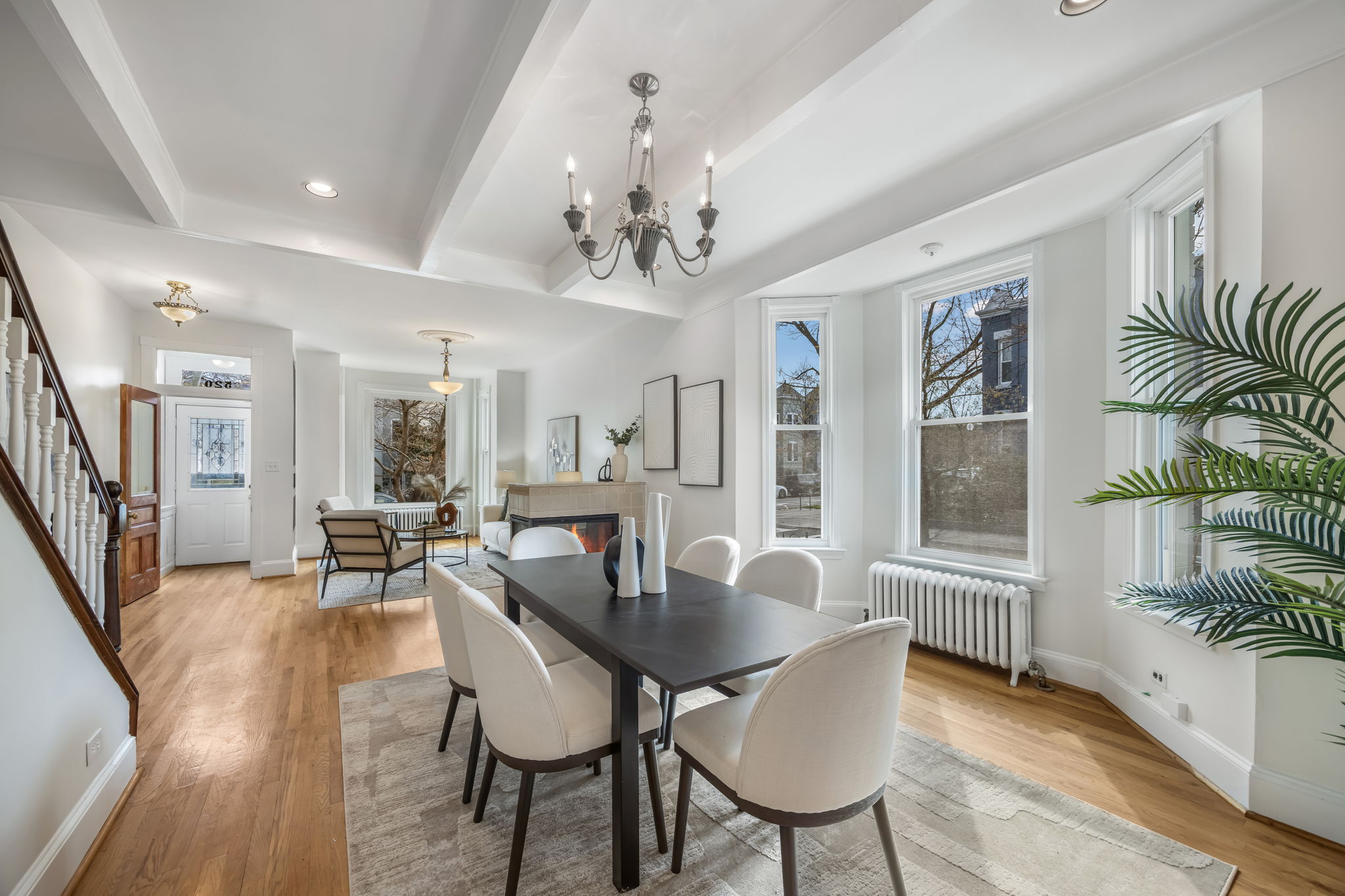 Separate dining area w high ceilings and hardwoods