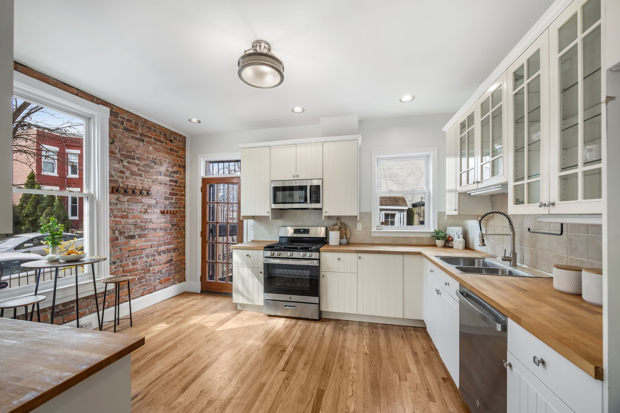 Spacious, updated, eat-in kitchen opens to patio