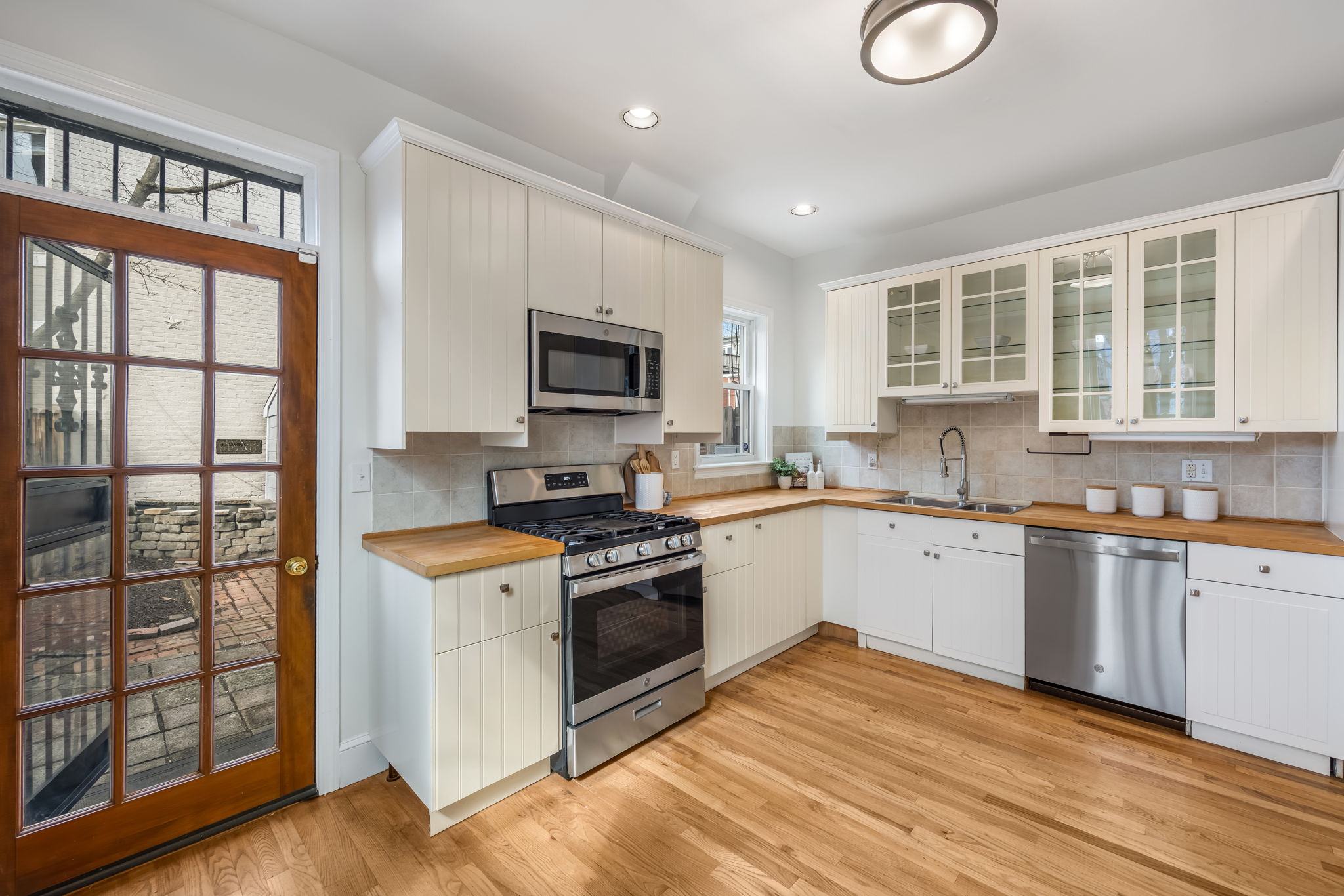 Spacious, updated, eat-in kitchen opens to patio