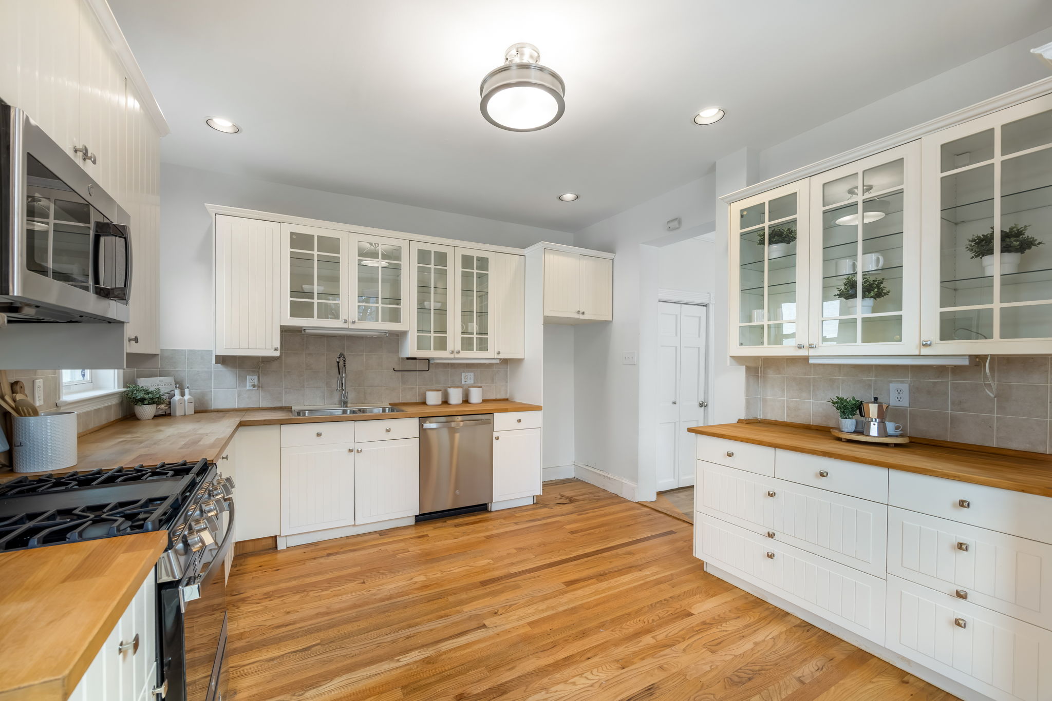 Spacious, updated, eat-in kitchen opens to patio