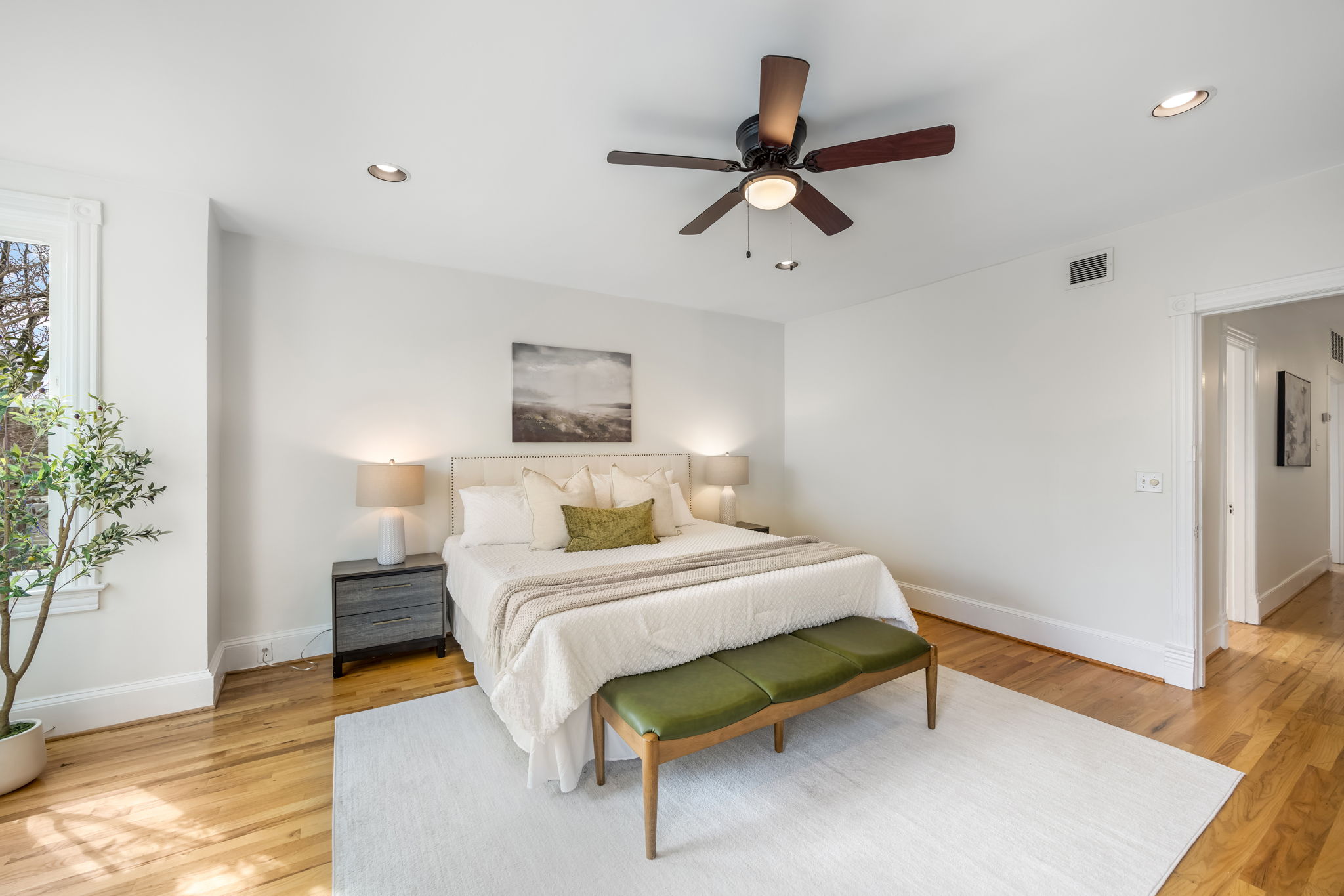 Spacious primary bedroom on upper level