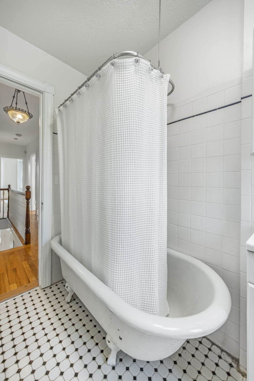 Upper level hall bath with skylight