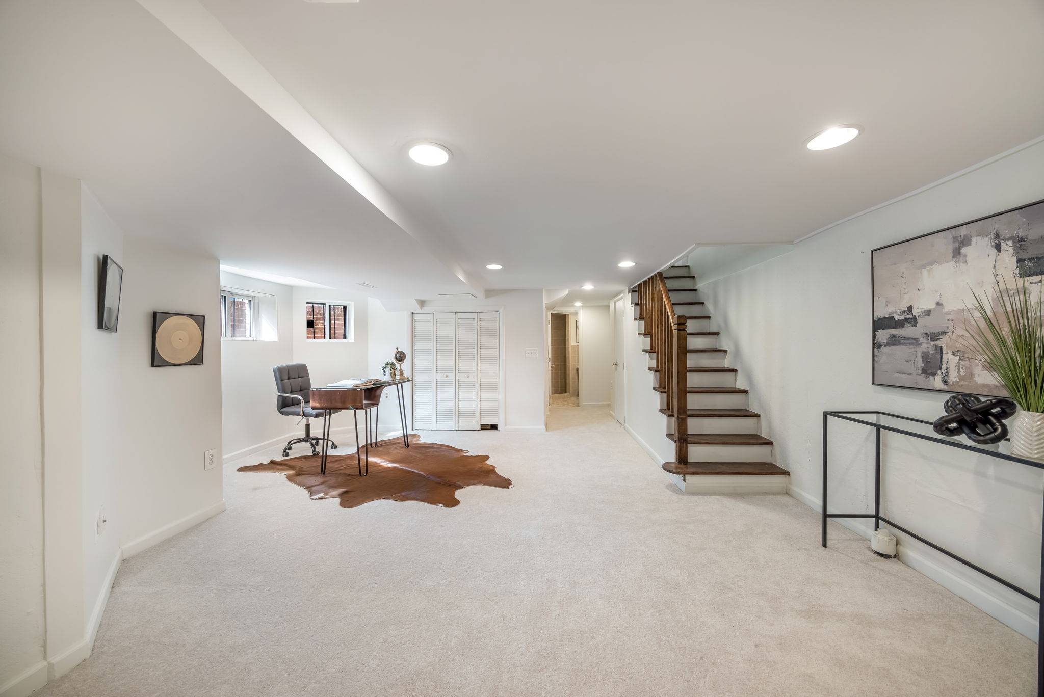 Expansive lower level rec room w new carpet