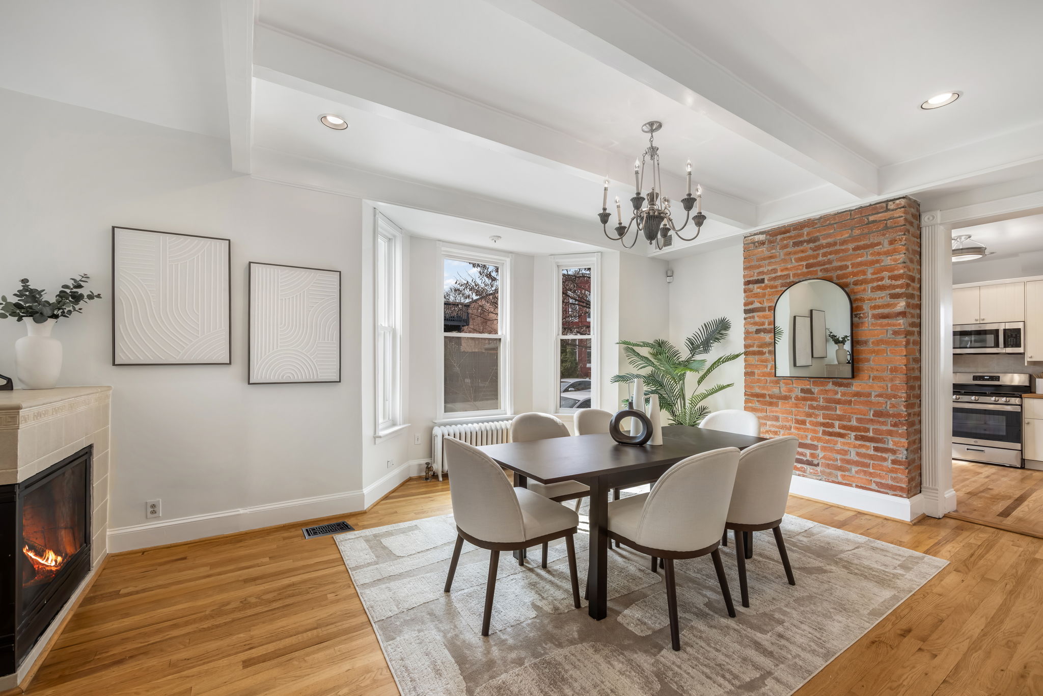 Separate dining area w high ceilings and hardwoods