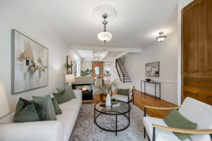 Open main level w high ceilings & gas fireplace