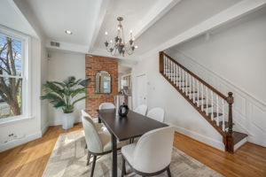Separate dining area w high ceilings and hardwoods