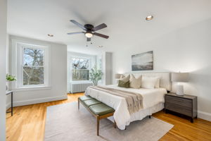 Spacious primary bedroom on upper level