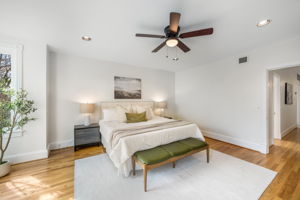 Spacious primary bedroom on upper level