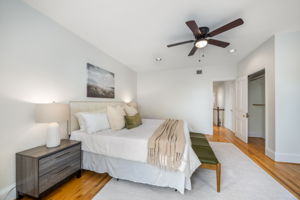 Spacious primary bedroom on upper level