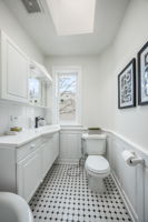 Upper level hall bath with skylight