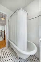 Upper level hall bath with skylight