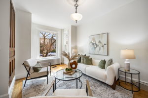 Open main level w high ceilings & gas fireplace