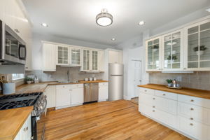 Spacious, updated, eat-in kitchen opens to patio