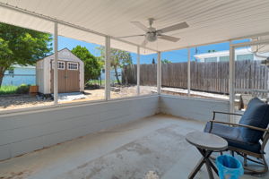 Porch enclosed with shed outdoors