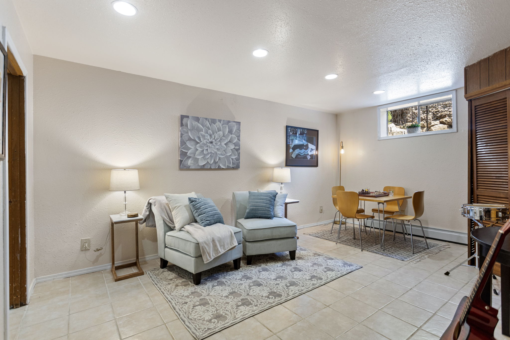 The bonus room. Game room, flex space, music room, whatever the lower level needs it to be.