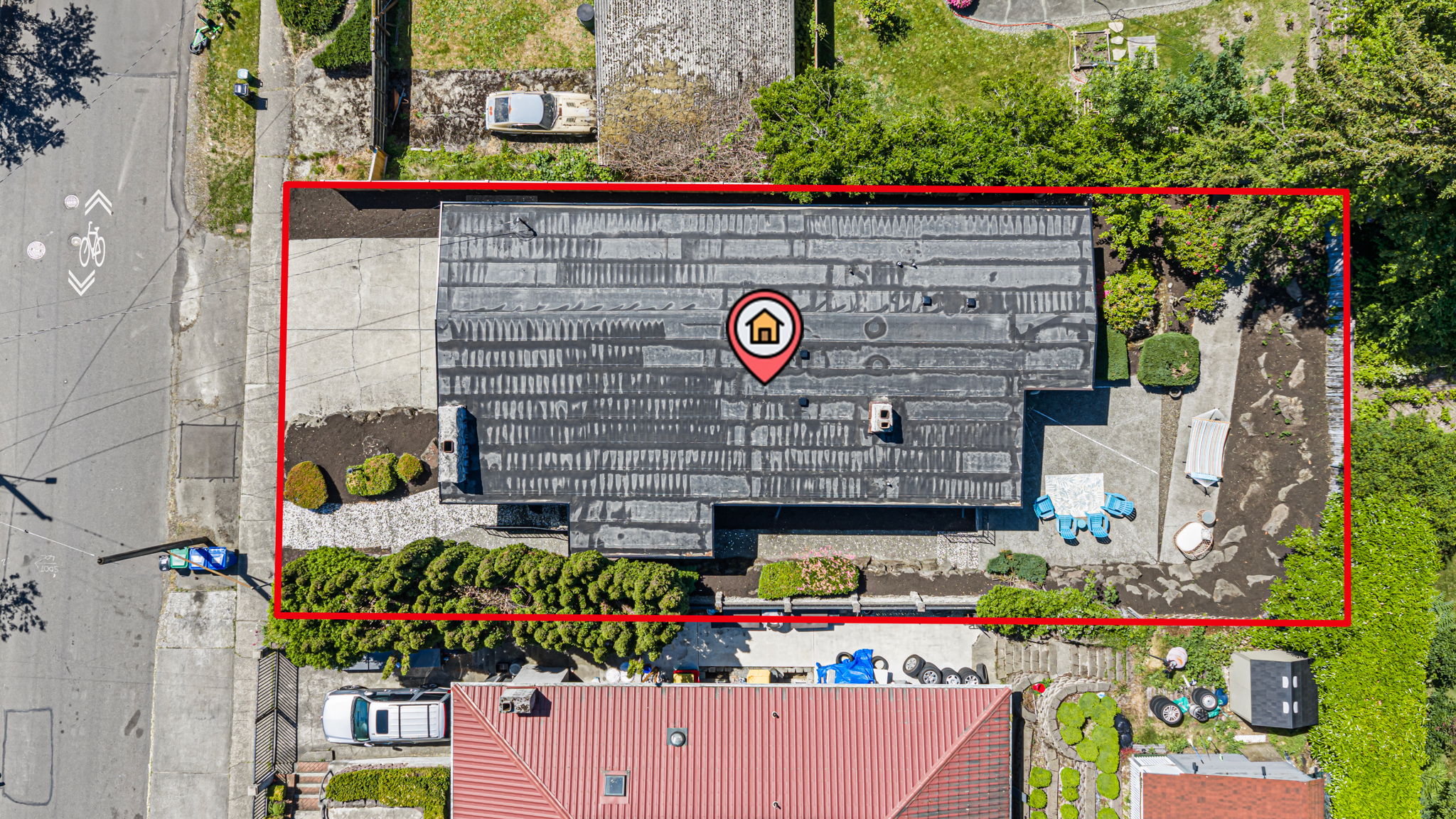 6,300 SF lot in Seward Park. The red line shows where it ends — which takes a moment.