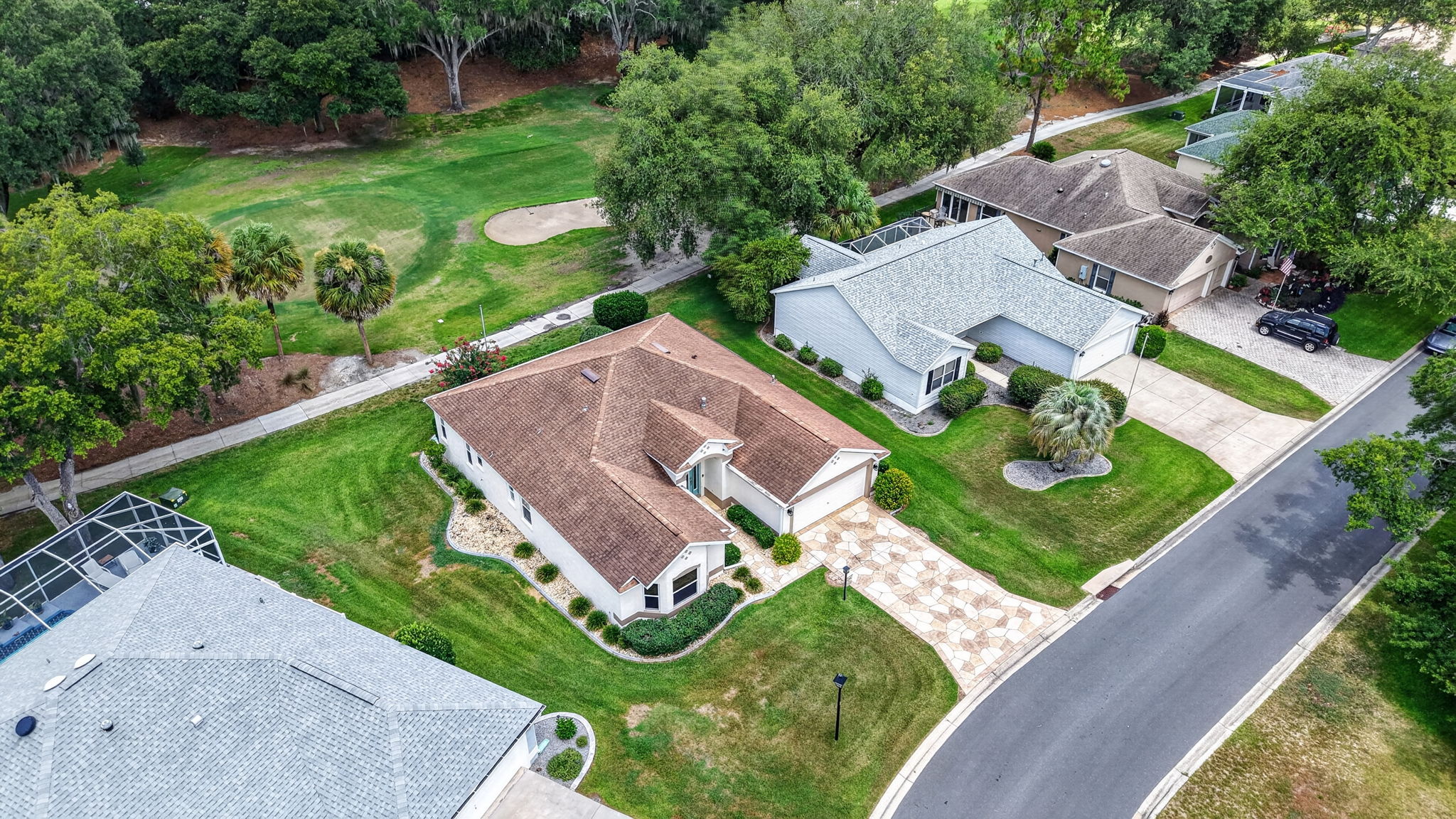 Aerial Front and Side Elevation with Amazing Golf Front Views!