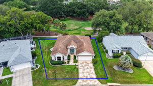 Aerial Front Elevation with Property Lines and Golf Front Views!