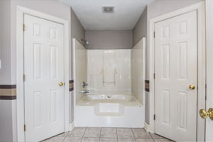 Owner's Bath with 2 Walk-In Closets