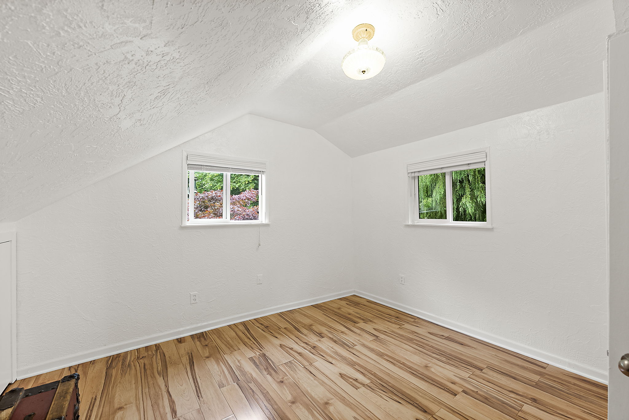 Spacious and bright upstairs bedroom.