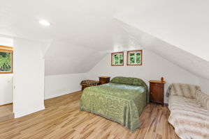 Spacious and bright primary bedroom. Brand new windows above the bed.