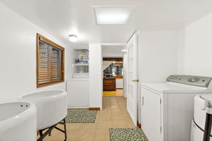 Laundry room off the kitchen and main bathroom.