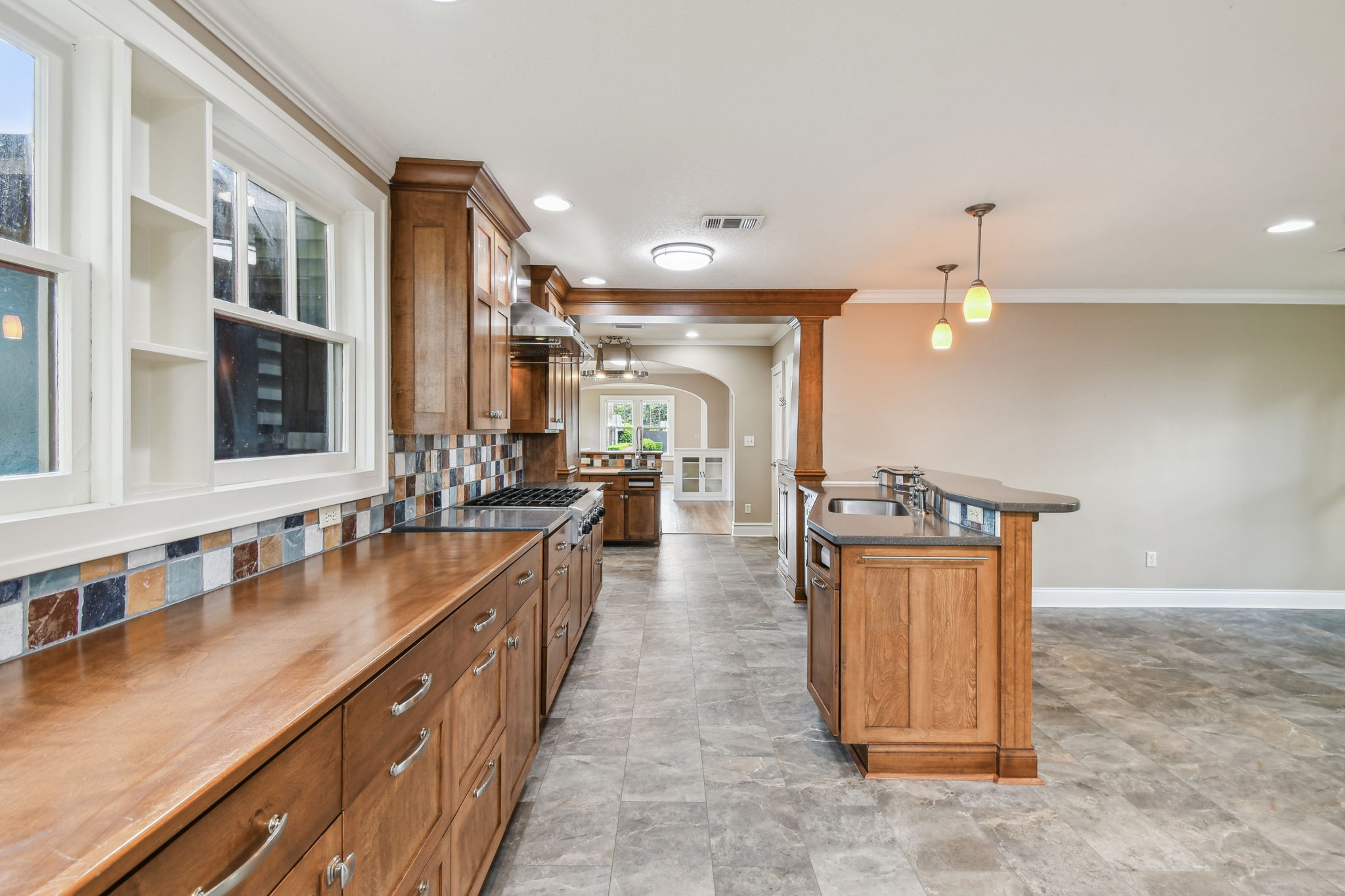 Matching custom cabinet provides extra storage