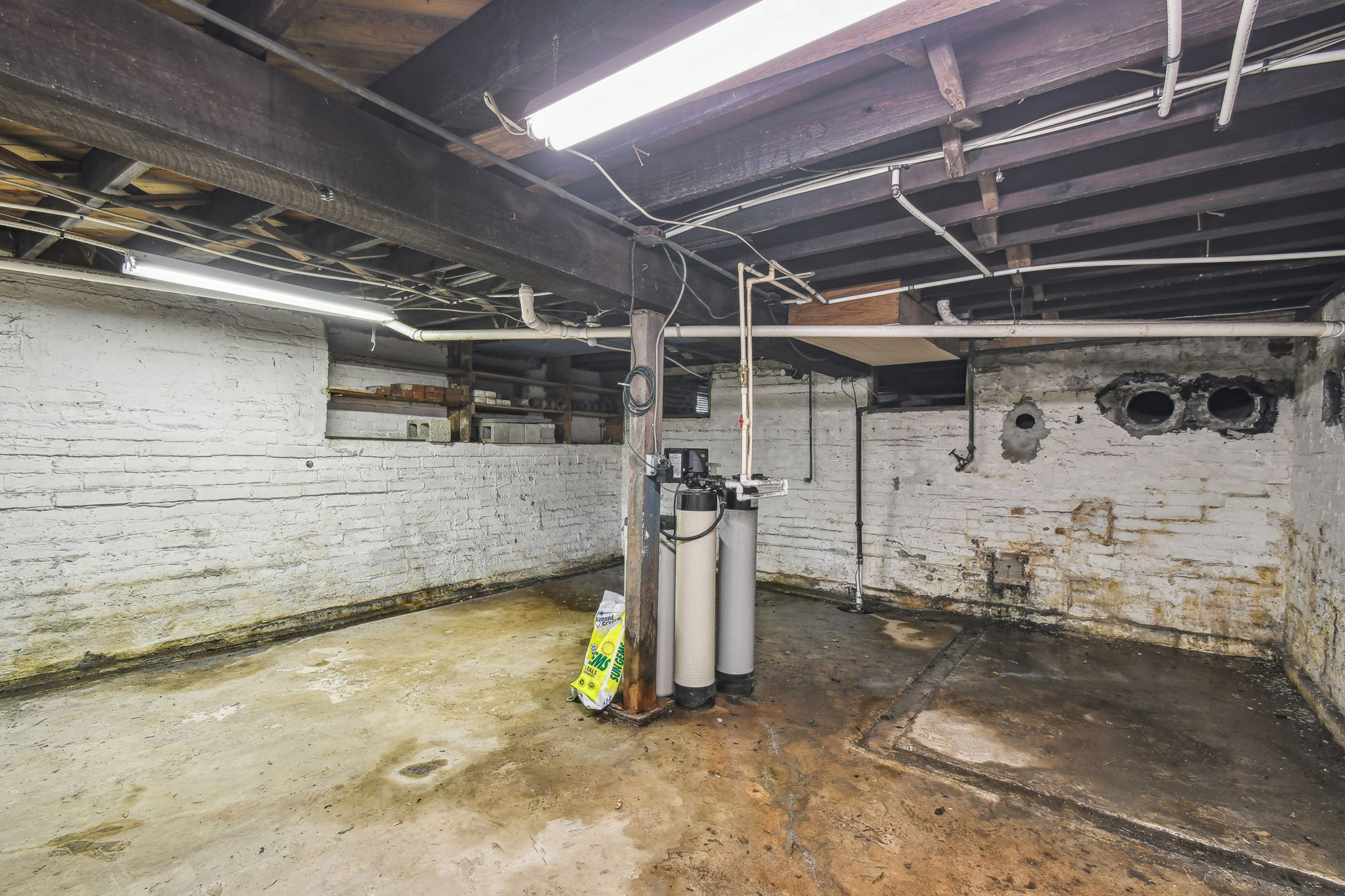 Cellar with water softener/purifier and sump pump