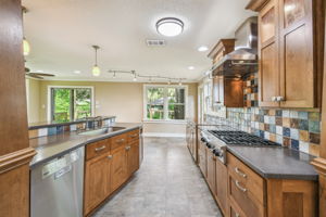 Kitchen is open to dining nook and family room