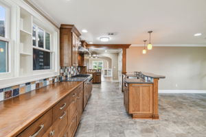 Matching custom cabinet provides extra storage